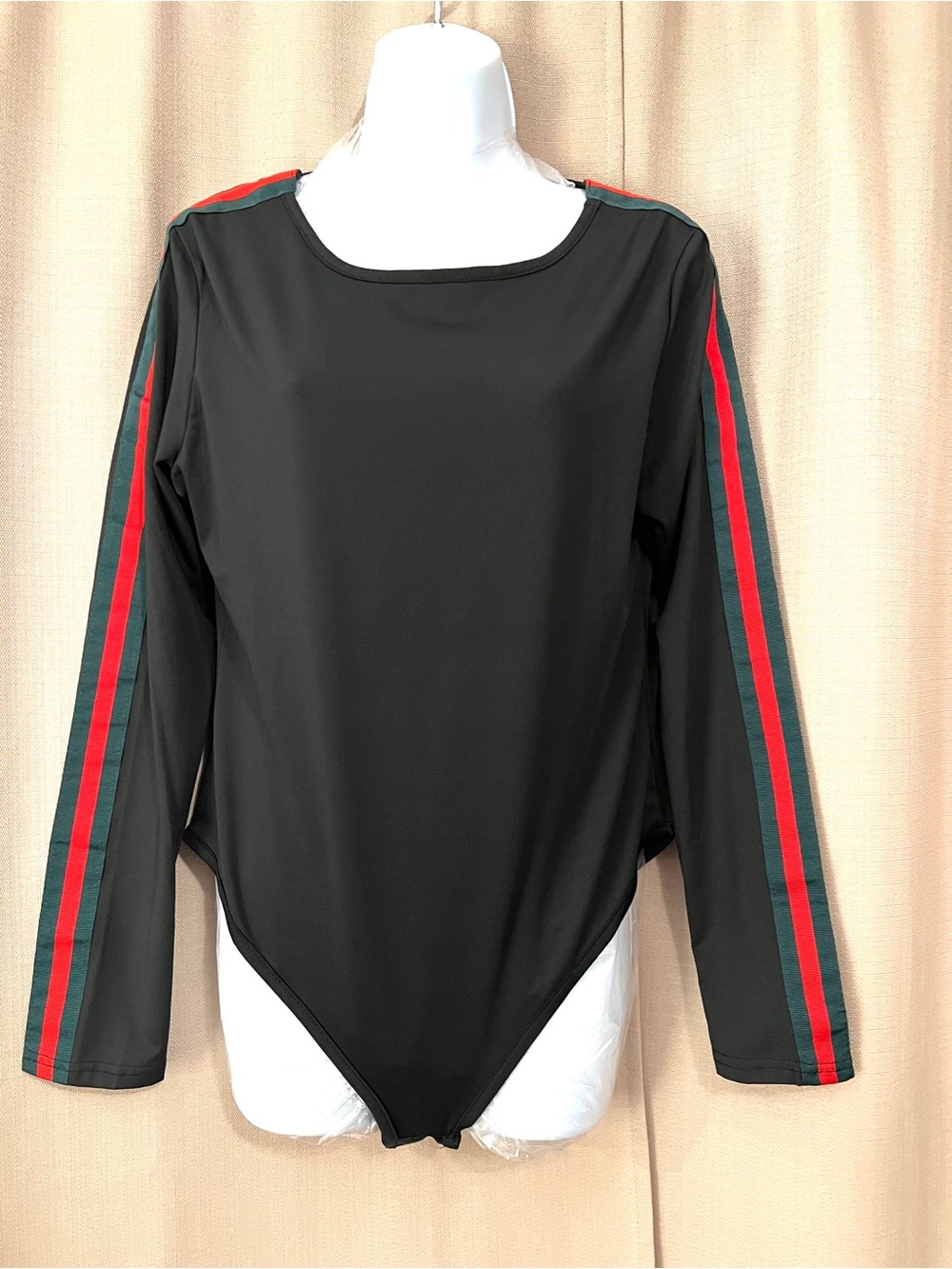Black Long-Sleeve Bodysuit with Red and Green Sleeve Stripes